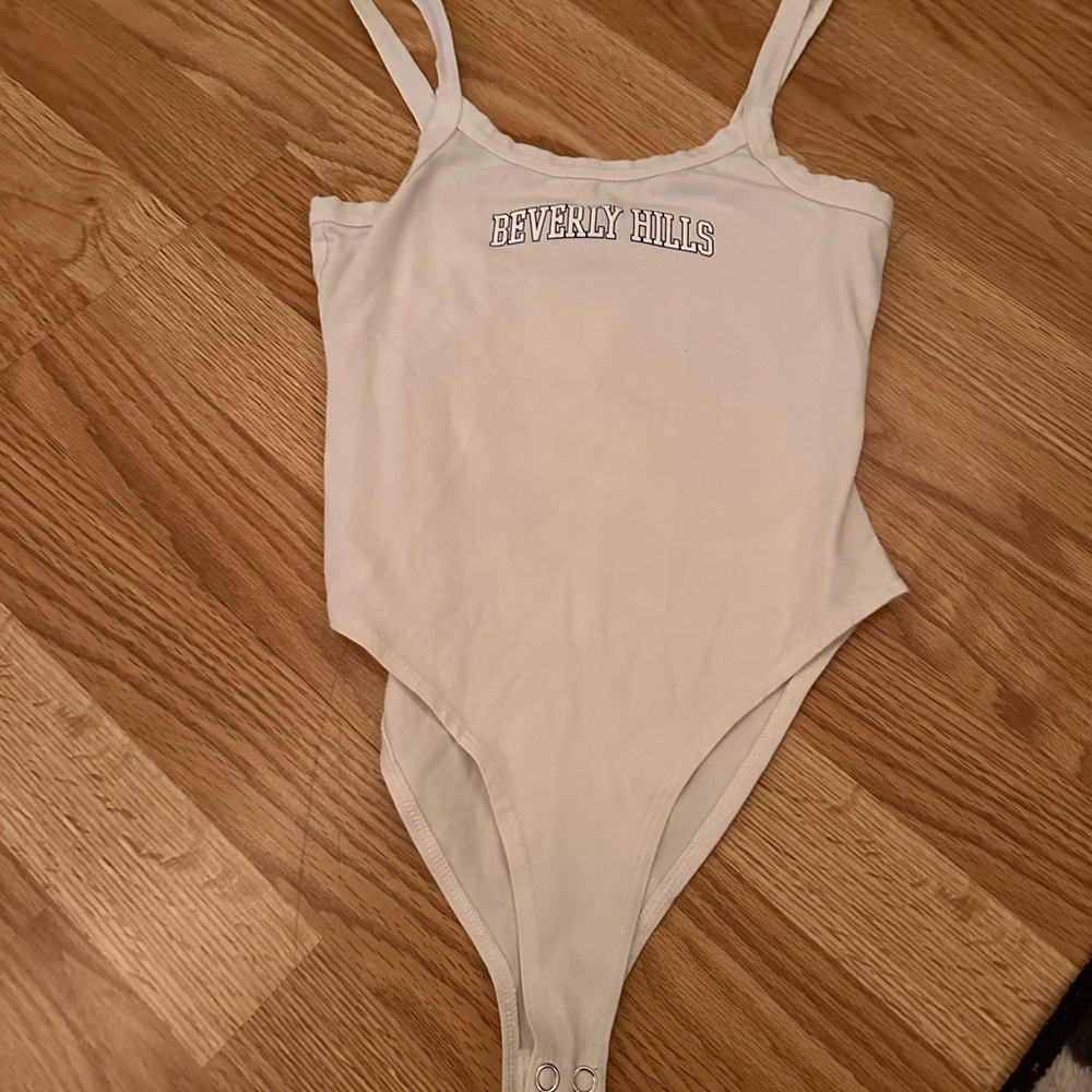 Cream body suit size small
